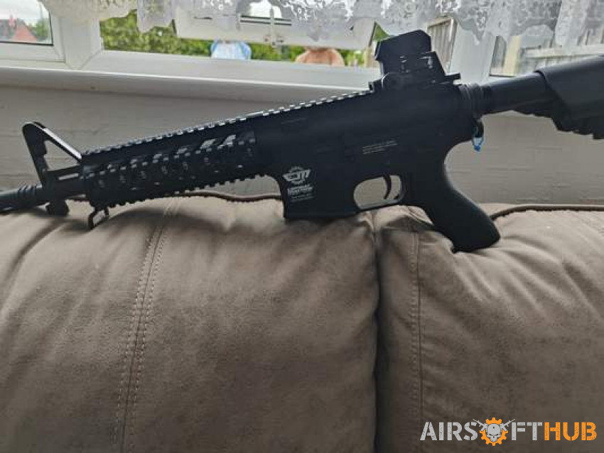 CM16 with battery charger - Used airsoft equipment