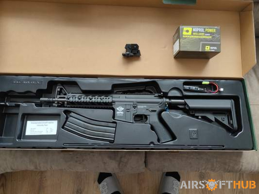 CM16 with battery charger - Used airsoft equipment