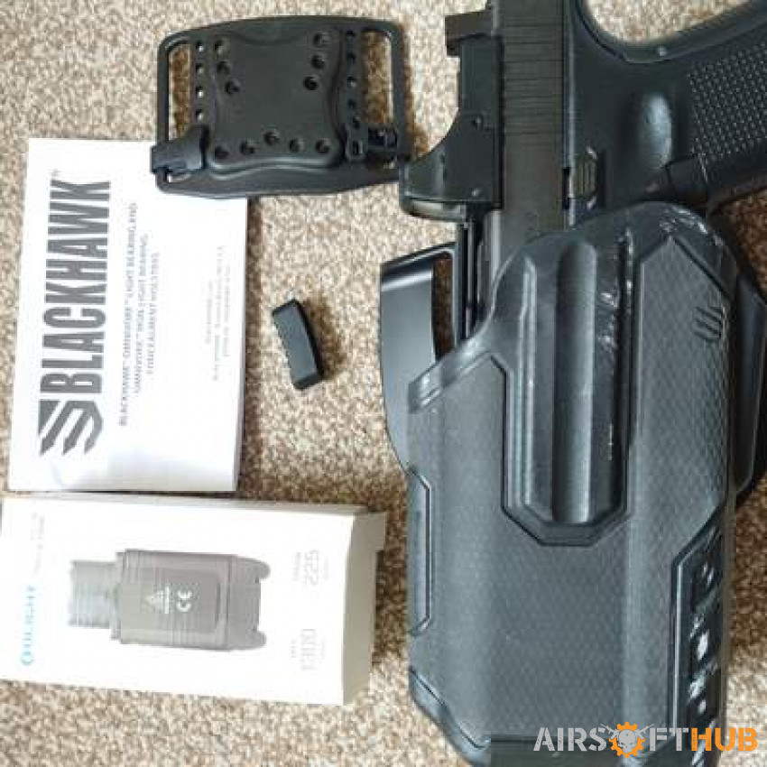 Blackhawk holster + flashlight - Used airsoft equipment