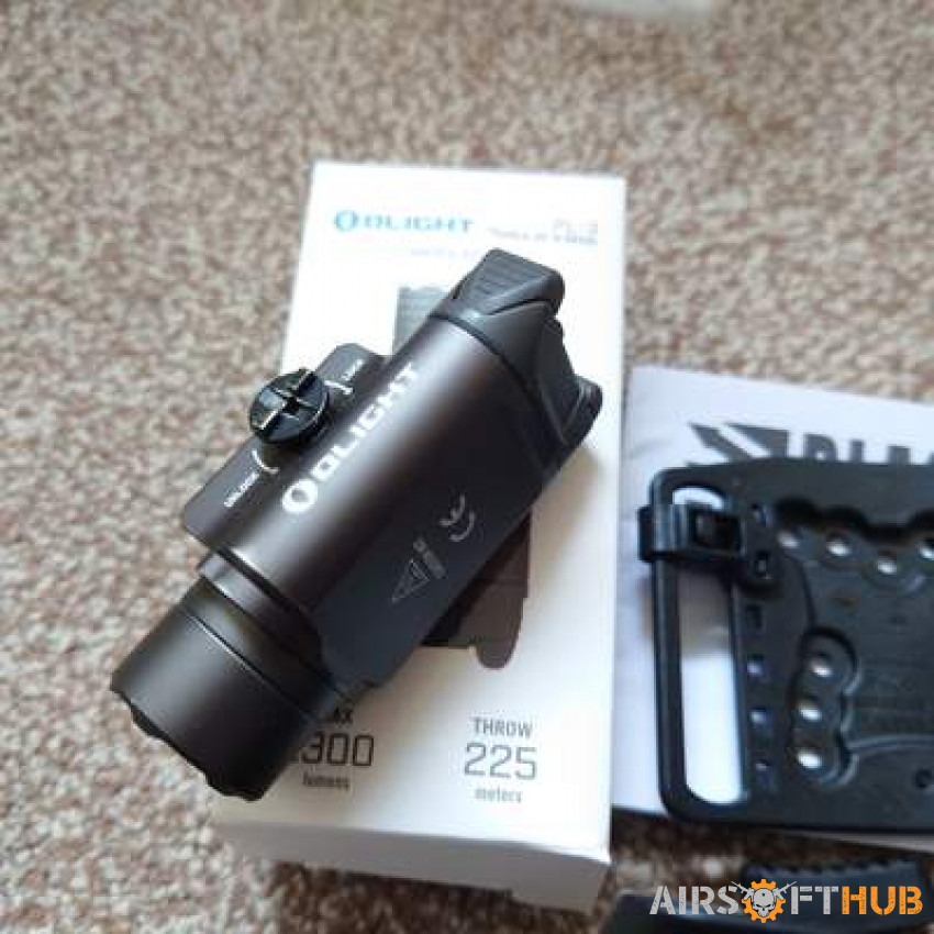 Olight torch+blackhawk holster - Used airsoft equipment