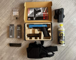 WE M1911 Gas pistol package - Used airsoft equipment